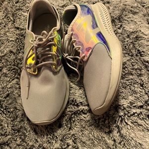 Brand new in box comfy New Balance response in a fun hologram and gray color!